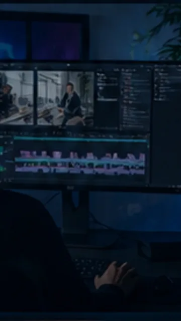 An editor working with a video timeline